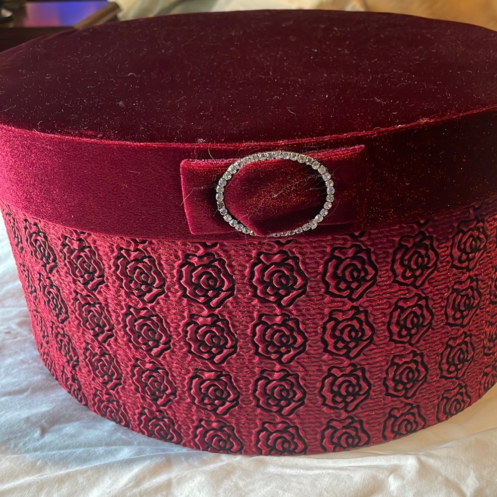 An Oval shape red velvet Gift box
